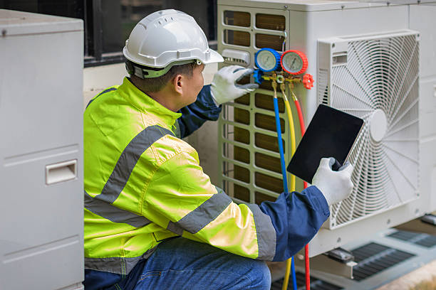 Professional Air Conditioning Repair technician working in Ashippun, WI
